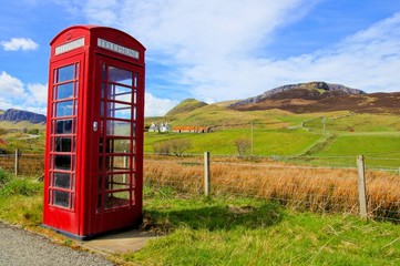 Classic red British phone booth in the countryside,Scotland