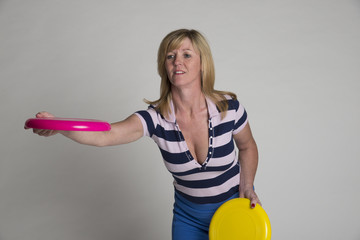 Woman throwing a frisbee disc
