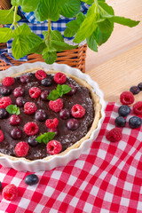 chocolate tartelette with forest fruits