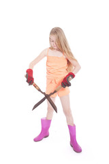 young blond girl with garden shears in studio