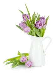 Pink tulips bouquet in pitcher