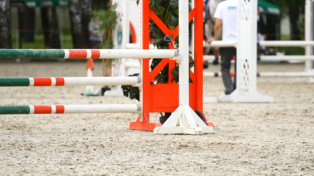 Horse jump a hurdle in competition