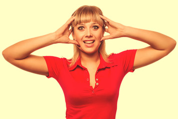 Fototapeta premium young girl beautiful woman face surprised surprise red shirt iso