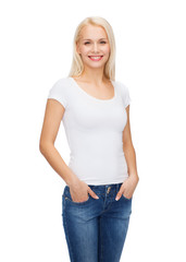 Fototapeta premium smiling woman in blank white t-shirt