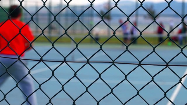 Tennis Court Behind the Wires