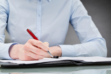 Businesswoman Signing Contract