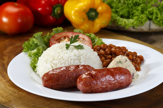 Sausage with rice and salad