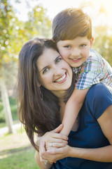 Attractive Mixed Race Mother and Son Hug in Park