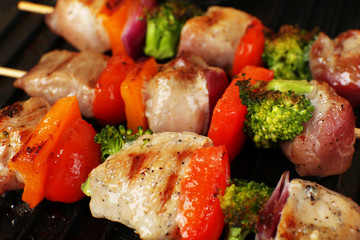 Pork kebab on grill close up