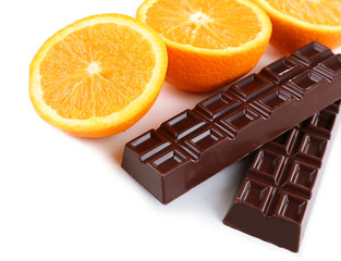 Chocolate and orange isolated on white
