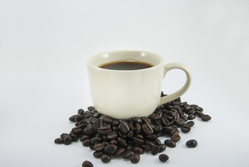 Coffee cup and coffee beans