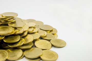 Gold coins on white background