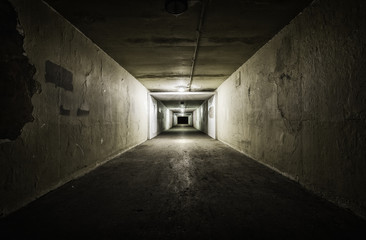 Empty tunnel at night