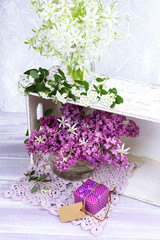 Beautiful spring flowers on wooden table, close up