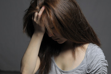 Obraz premium Depressed woman in despair