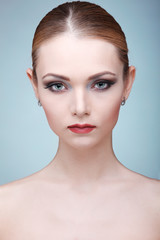Fototapeta premium Beautiful girl, on a light-grey background