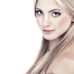 Naklejka premium portrait of whiteheaded young woman with blue eyes on white 