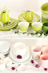 Different tableware on shelf, close up