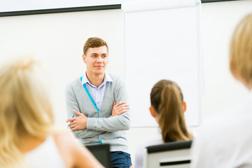 teacher talking with students