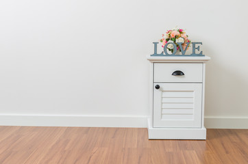 Love sign on bedside table