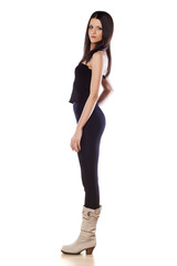 side view of skinny young girl in tights