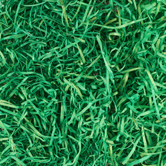 Green ribbons as artificial grass decoration