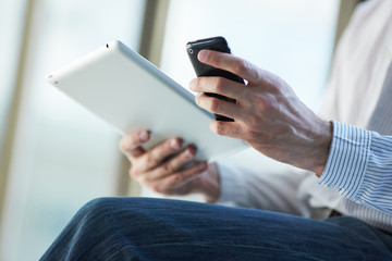 man holding digital tablet