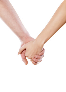 male and female hand holding each other