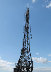 A Tall Vintage Dockside Jib Cargo Crane.