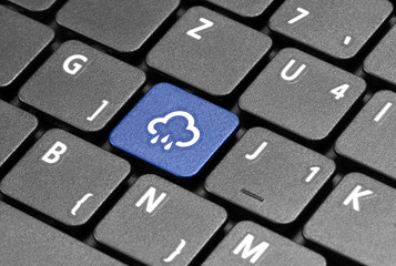 Rain. Weather. Blue hot key on computer keyboard.