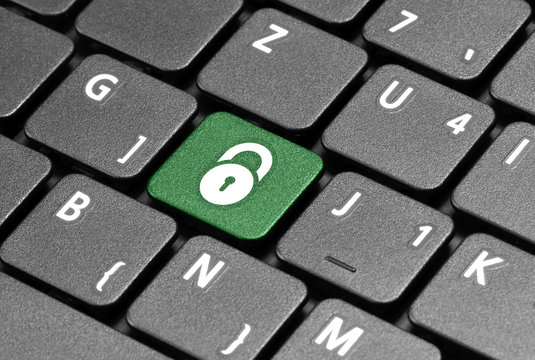 Padlock. Protected. Green hot key on computer keyboard.