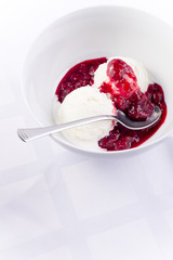 Vanilla ice cream with raspberry sauce Heisse Liebe