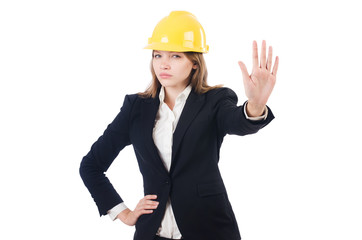 Pretty businesswoman with hard hat isolated on white