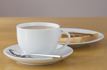 Cup of tea with slice of toast