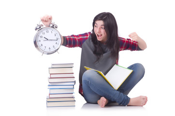 Young female student missing her deadlines on white
