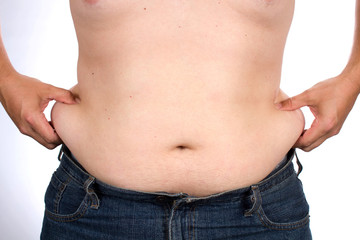 Man Pinching His Belly Fat Around Waist