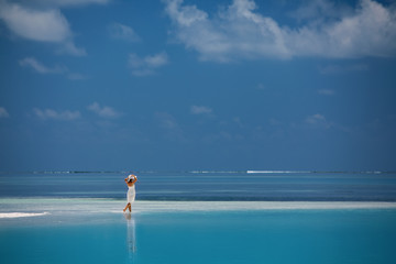 Caucasian woman rests at beautiful seashore