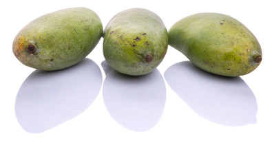 Green mango fruit over white background