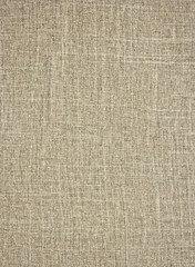 Fototapeta na wymiar Beige natural cloth texture background.Brown linen.