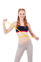 Young girl with centimeter in dieting concept