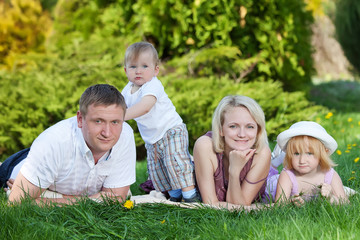 Fototapeta premium Happy family in the park