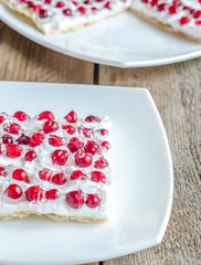 Tart with whipped cream and fresh cranberries