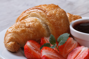 Croissant with fresh strawberries and jam macro