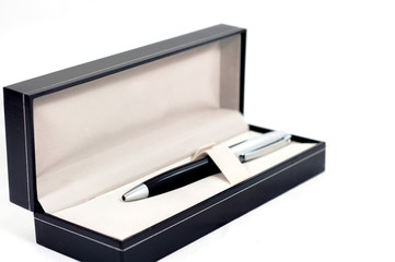 Pen in box on white background