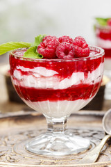 Raspberry layer dessert in glass bowl