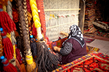 Weaver on Traditional Turkish Hand Loom - 64737385