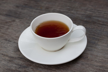 Cup of tea on old wooden