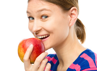 Young happy girl with apple