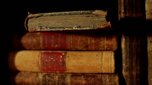 Ancient books, panning left to right