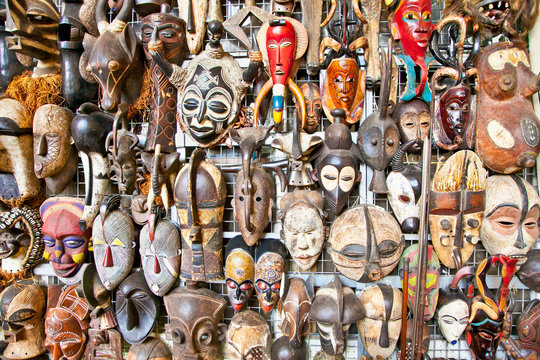 Old african masks sale at market in Nairobi, Kenya.